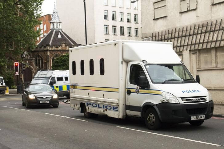 Police vehicles escort a prison van as it arrives at Westminster Magistrates' Court in London, Britain June 18, 2016.   Anthony Devlin/Press Association via REUTERS
