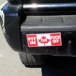 ‘Fit in or F*** O**’ Stickers Appear in Canada