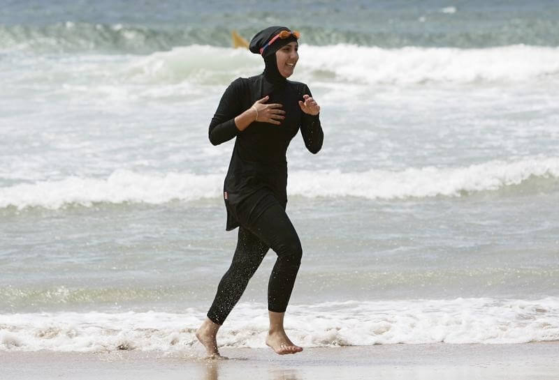 Police in Cannes stop Muslim women wearing banned burkinis