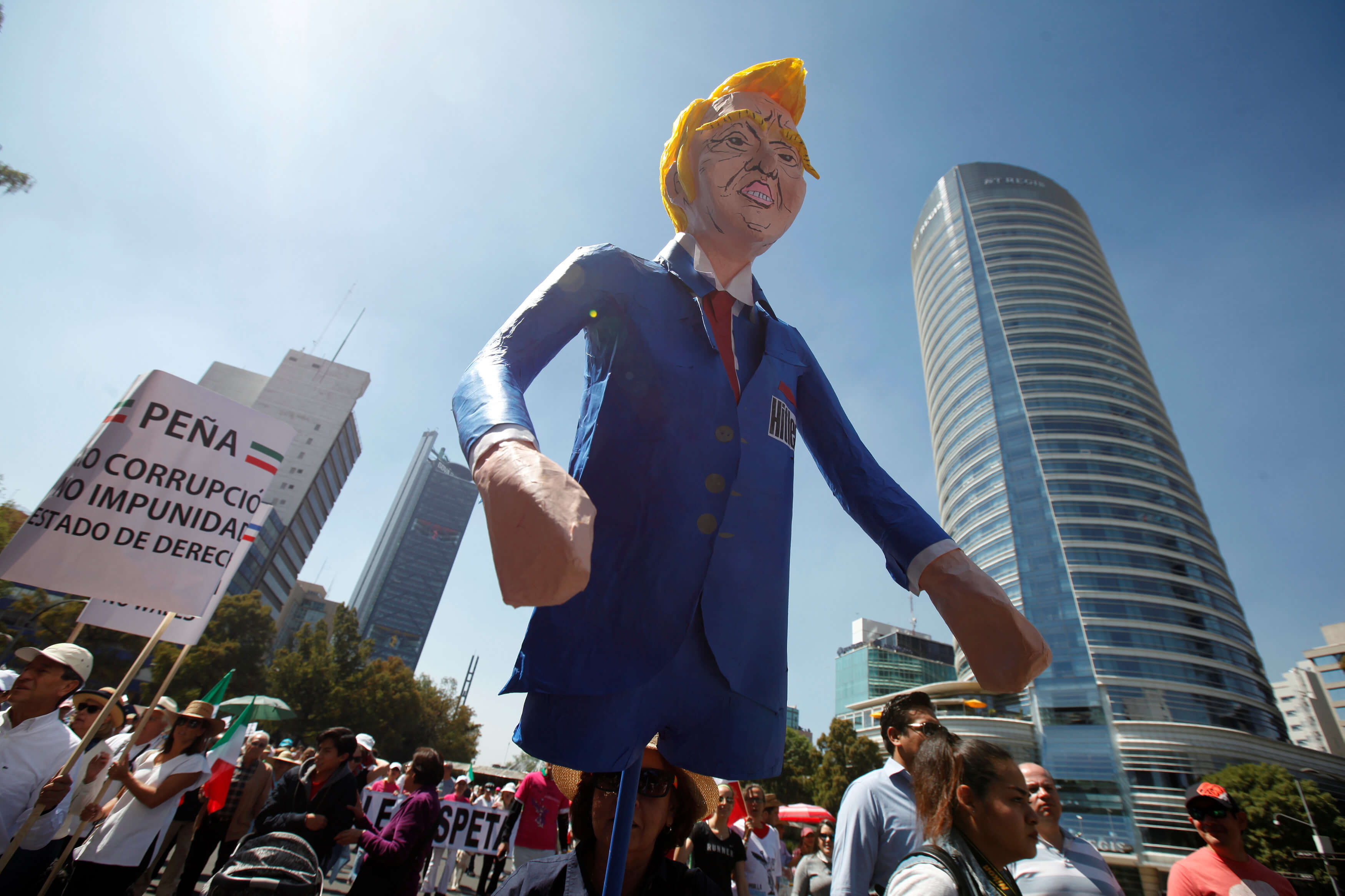 Marchers across Mexico vent anger over Trump, and their own president